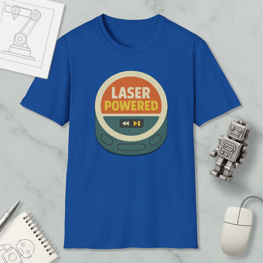 a blue t-shirt with a graphic design, a computer mouse, a notebook, and a small robot on a marble surface.