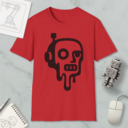 a red t-shirt with a black graphic design depicting a dripping, skull-like face, along with a computer mouse, a notebook, and a small robot figurine.