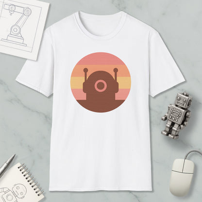 a white t-shirt with a graphic design of a robot or robot-like figure, along with various objects such as a computer mouse, a notebook, and a pen.