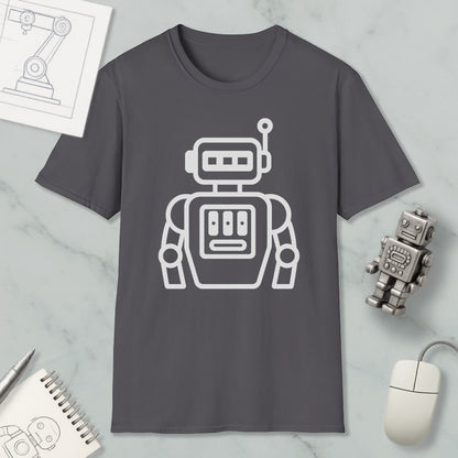 a gray t-shirt with a white robot graphic, along with a computer mouse, a notebook, and a pen on a marble surface.