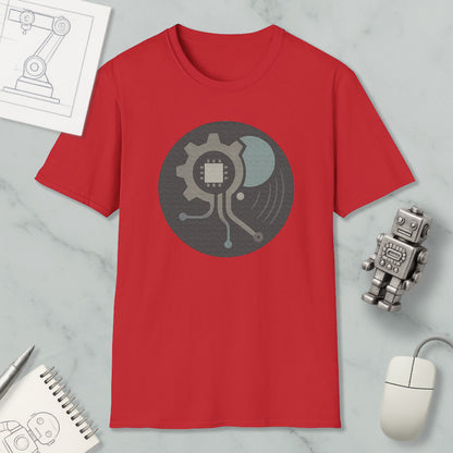 a red t-shirt with a graphic design, a computer mouse, a notebook, and a small robot on a marble surface.