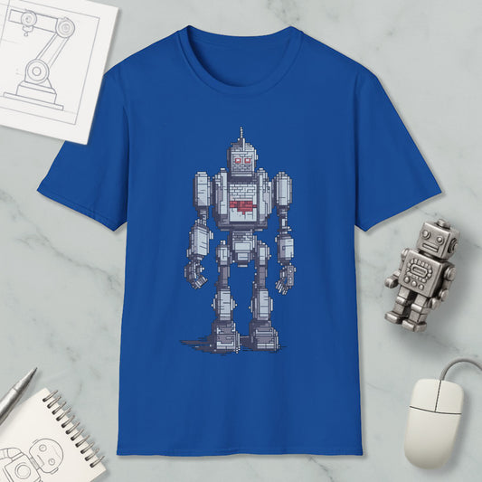 a blue t-shirt with a pixelated robot design, along with a computer mouse, a notepad, and a pen on a marble surface.
