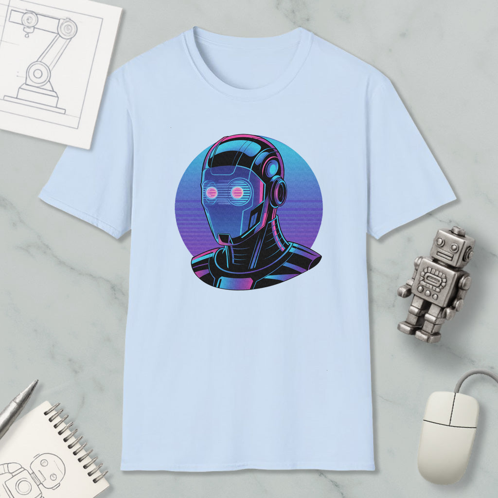 a light blue t-shirt with a graphic design of a robot or cyborg head, along with various objects such as a computer mouse, a notebook, and a pen.