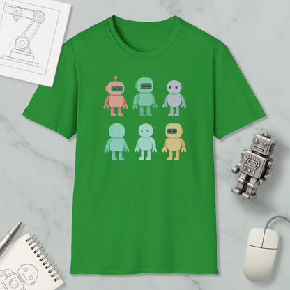 a green t-shirt with a graphic design of six colorful robot characters on it, along with various objects such as a computer mouse, a notebook, and a pen.