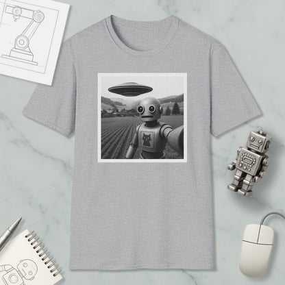 a gray t-shirt with a black and white photo of a robot, a small robot, and a computer mouse on a marble surface.