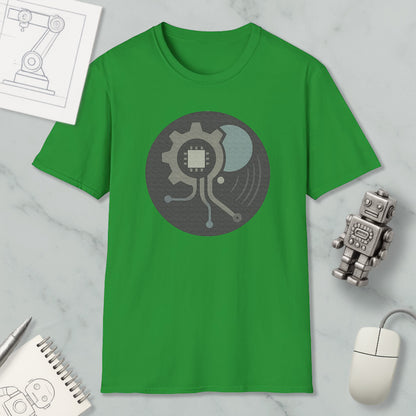 a green t-shirt with a graphic design, a small robot, a computer mouse, and a notebook on a marble surface.