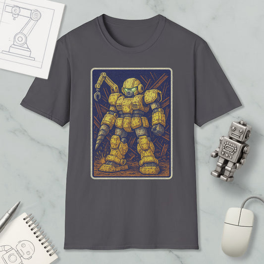 a gray t-shirt with a graphic design of a yellow robot or robot-like figure, surrounded by various objects such as a computer mouse, a notebook, and a pen.