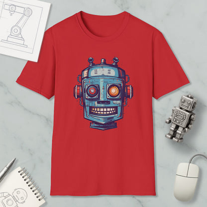 a red t-shirt with a robot design, along with a computer mouse, a notebook, and a pen on a marble surface.