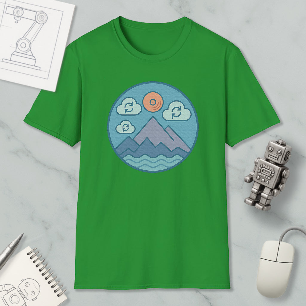 a green t-shirt with a circular graphic design depicting mountains, clouds, and a sun, along with a robot and a computer mouse.