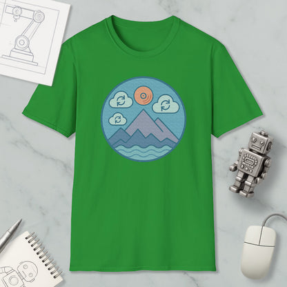 a green t-shirt with a circular graphic design depicting mountains, clouds, and a sun, along with a robot and a computer mouse.
