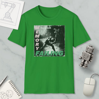 a green t-shirt with a graphic design depicting a person in a robot-like pose, along with the text "The Crash Memory Failure".