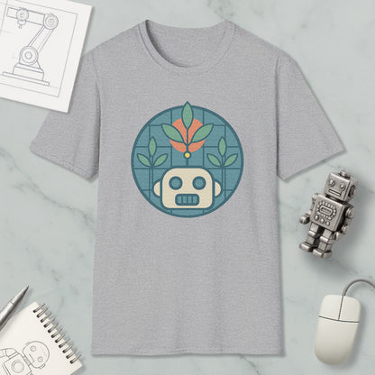 a gray t-shirt with a graphic design of a robot and plants, along with a computer mouse and a notebook on a marble surface.