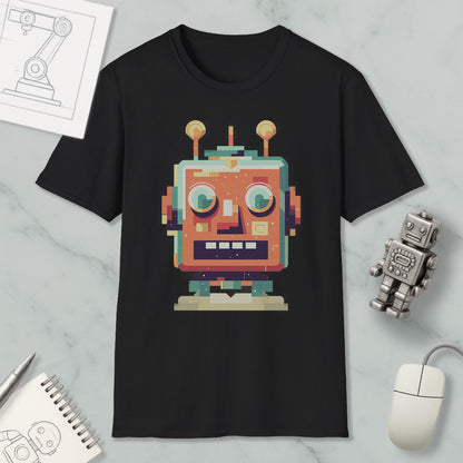 a black t-shirt with a colorful robot graphic printed on it, along with various objects such as a computer mouse, a notebook, and a small robot figurine.