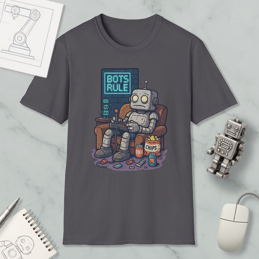 a t-shirt with a cartoon robot sitting in a chair, surrounded by various objects such as a computer mouse, a notebook, and a robot figurine.