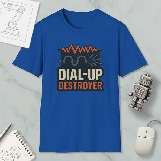 a blue t-shirt with a graphic design, a computer mouse, a notebook, and a small robot on a marble surface.