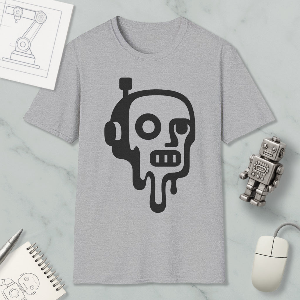 a gray t-shirt with a black graphic design depicting a robot or robot-like figure with dripping or melting features, surrounded by various objects such as a computer mouse, a notebook, and a small robot figurine.