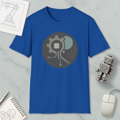 a blue t-shirt with a graphic design, a computer mouse, a notebook, and a small robot figurine on a marble surface.