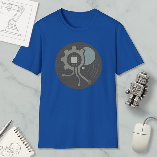 a blue t-shirt with a graphic design, a computer mouse, a notebook, and a small robot figurine on a marble surface.