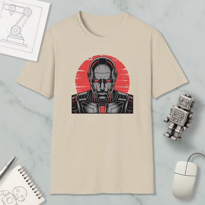 a beige t-shirt with a graphic design depicting a robot or cyborg-like figure, along with various office supplies and a computer mouse.