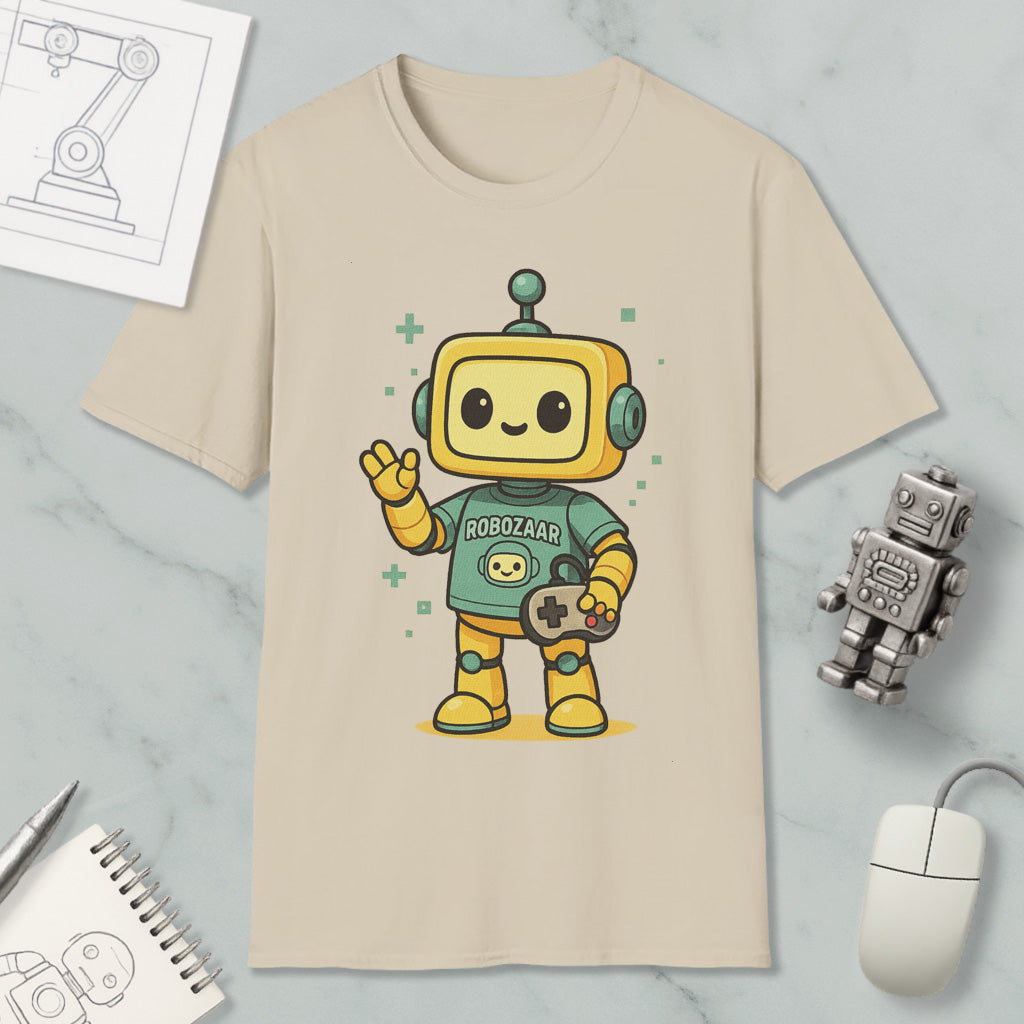 a t-shirt with a cartoon robot character, a mouse, a notebook, and a pen on a marble surface.