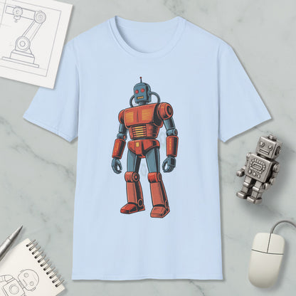 a light blue t-shirt with a red and blue robot graphic printed on it, along with various objects such as a computer mouse, a notebook, and a pen.