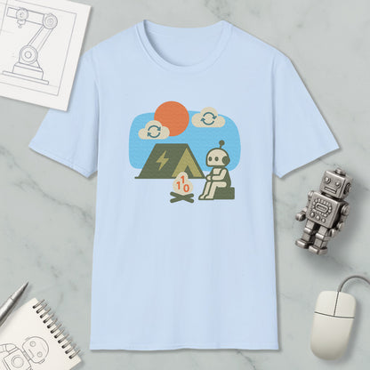 a light blue t-shirt with a graphic design depicting a robot sitting by a campfire, with a tent and a small robot figurine nearby.