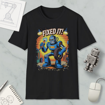 a black t-shirt with a colorful graphic design depicting a robot character holding a wrench and the text "FIXED IT!"