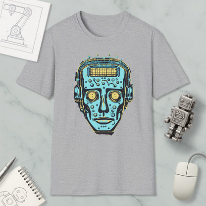 a gray t-shirt with a graphic design of a robot's face, surrounded by various objects such as a computer mouse, a pen, a notebook, and a robot toy.