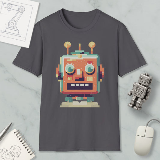 a gray t-shirt with a colorful robot graphic printed on it, along with various objects such as a computer mouse, a notebook, and a small robot figurine.