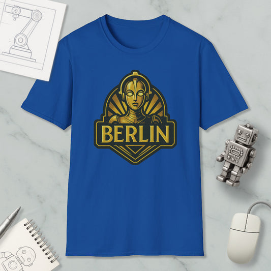 a blue t-shirt with a graphic design of a robot or character, along with a computer mouse and other office supplies.