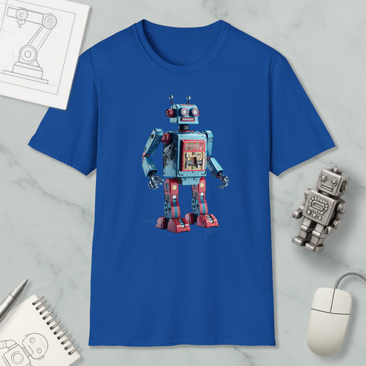 a blue t-shirt with a robot design, along with a computer mouse, a notebook, and a pen on a marble surface.