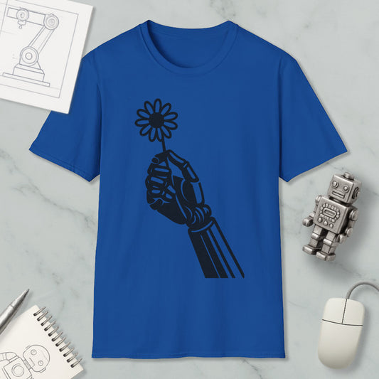 a blue t-shirt with a black graphic design of a hand holding a flower, along with a computer mouse, a notebook, and a small robot figurine.