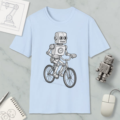 A light blue t-shirt with a cartoon robot riding a bicycle, accompanied by a computer mouse, a notebook, and a drawing of a robot.