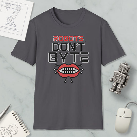 a gray t-shirt with a graphic design that says "ROBOTS DON'T BYTE" and includes a robot's mouth with teeth. The t-shirt is displayed on a marble surface, along with a computer mouse, a notepad, and a pen.