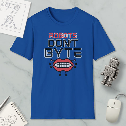 a blue t-shirt with a graphic design that says "ROBOTS DON'T BYTE" and includes a robot mouth with teeth. The t-shirt is placed on a marble surface, along with a computer mouse, a notepad, and a pen.