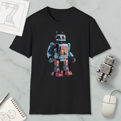 a black t-shirt with a colorful robot design printed on it, along with various objects such as a computer mouse, a notebook, and a pen.